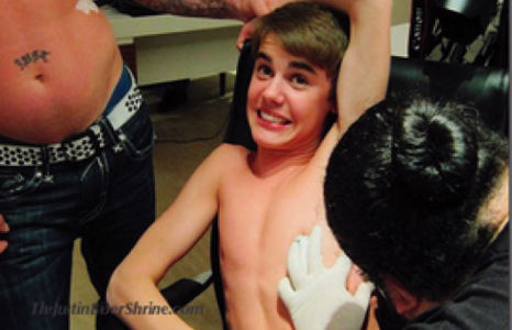 Жастины шинэ шивээс