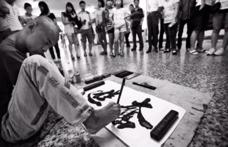 Хятадын гудамжны тахир дутуу зураач Си